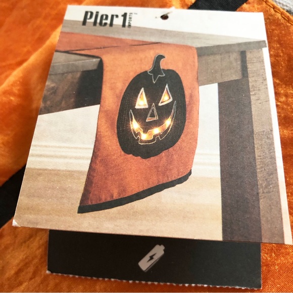 Jack-O-Lantern Light Up table Runner Size: 13”X 72”. Pier 1 - Picture 2 of 6